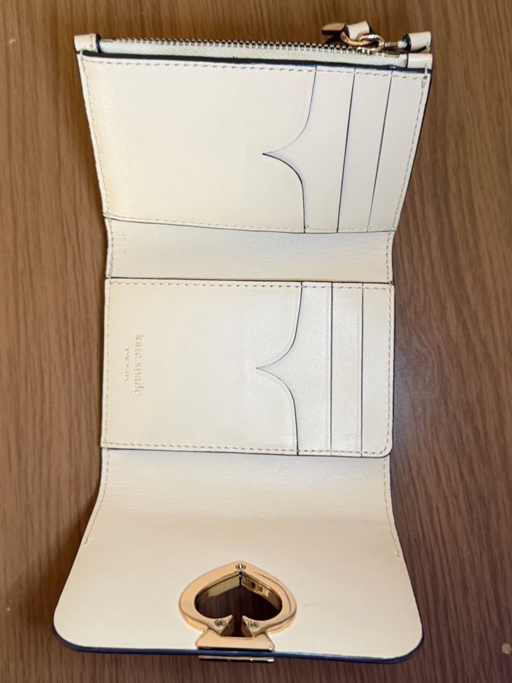 Kate Spade Cream Leather Compact Wallet with Spade Heart Emblem - Picture 7 of 9